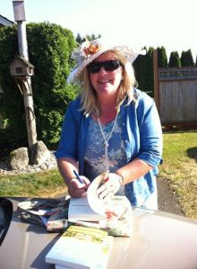 Author Shannon Winslow, "slave to fashion", signing books at JA tea.